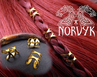 3 Viking hair beads in fine gold-colored metal that can be spread apart and tightened.