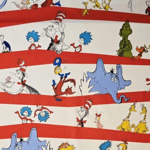 Dr. Seuss fabric for Robert Kaufman pattern #ADE 10788-203. Sold by the yardage and half yard cuts.  Children's fabric, cat fabric