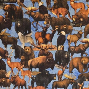 Wild animals byDan Morris for QT Fabrics. Sold by the yardage and half yard cuts. Bear fabric, Hunting fabric, moose fabric, deer fabric.