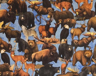 Wild animals byDan Morris for QT Fabrics. Sold by the yardage and half yard cuts. Bear fabric, Hunting fabric, moose fabric, deer fabric.