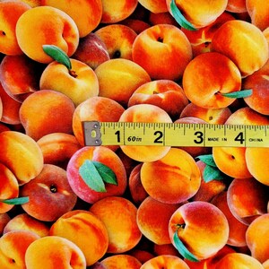 May include: A close-up of a fabric with a repeating pattern of peaches. The fabric is a peach color with a yellow tape measure across the middle. The tape measure reads "1 60in 2 3 MADE IN 4 CHINA".