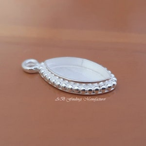 Sterling Silver Marquise Bezel Pendant: Beaded Cabochon Setting