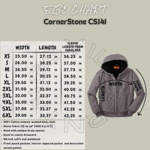 Pode incluir: Tabela de tamanhos para um casaco CornerStone CSJ41, com medidas em polegadas para largura, comprimento e comprimento da manga a partir do ombro. A tabela inclui tamanhos XS a 6XL. Um casaco cinzento com capuz é mostrado.