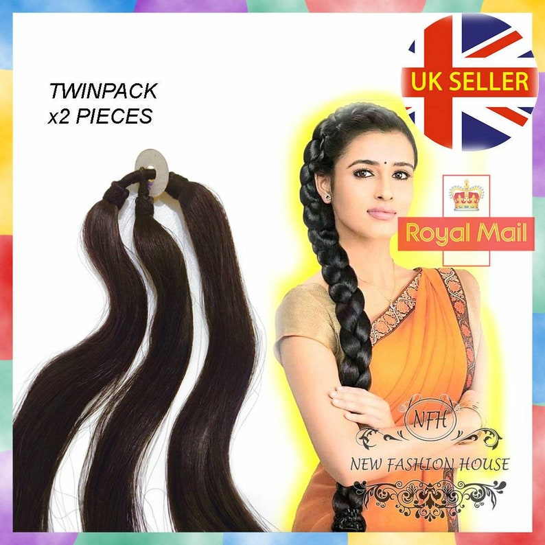 May include: Two packs of dark brown human hair extensions. The hair is long and straight, and it is tied together with a white elastic band. The text "Twinpack x2 Pieces" is printed on a white background.