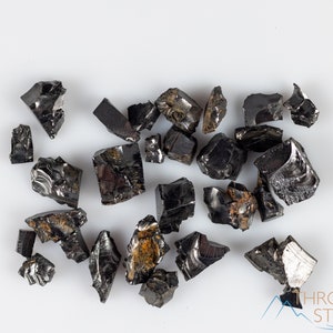 These Elite Noble Shungite Gemstones are a deep black color with a shiny, metallic luster. These rare crystals are the purest form of Shungite and are primarily found in Russia. Shungite is believed to have strong purifying and protective properties.