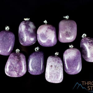 These purple Lepidolite crystal pendants are polished and freeform in shape.
Crystals are nature-made therefore each one is unique in appearance.