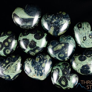 Kamaba Jasper is marbled many shades of green with round green splotches.
Crystals are nature-made therefore each one is unique in appearance.