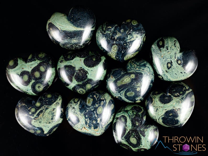 Kamaba Jasper is marbled many shades of green with round green splotches.
Crystals are nature-made therefore each one is unique in appearance.