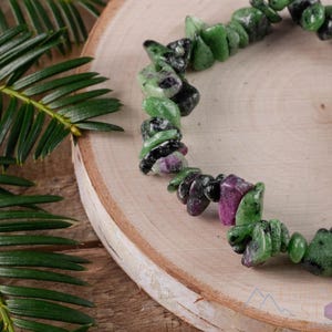 Handcrafted Genuine Ruby Zoisite chip bracelet. These green and red tumbled chips are drilled and strung on beading cord to create an endless bracelet. Each crystal bracelet is unique in shape and color and has a wrist circumference of about 6 inches