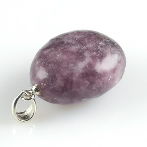 These purple Lepidolite crystal pendants are polished and freeform in shape.
Crystals are nature-made therefore each one is unique in appearance.