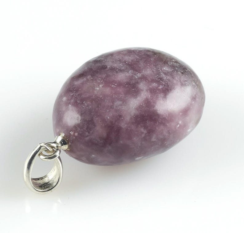These purple Lepidolite crystal pendants are polished and freeform in shape.
Crystals are nature-made therefore each one is unique in appearance.