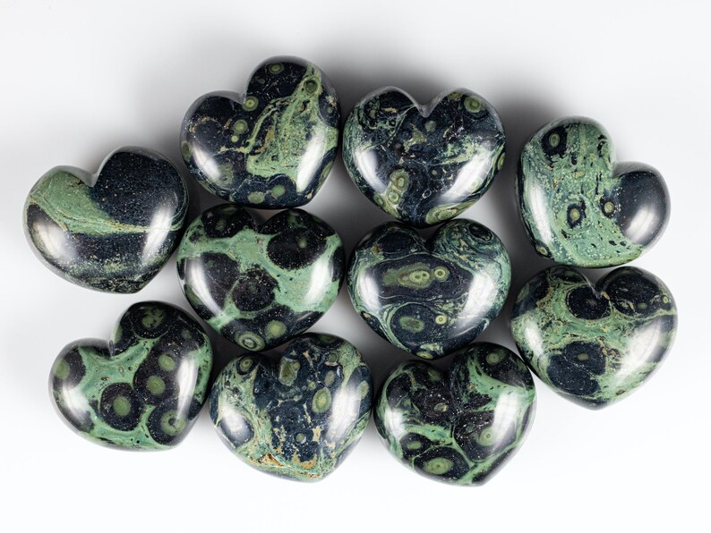 Kamaba Jasper is marbled many shades of green with round green splotches.
Crystals are nature-made therefore each one is unique in appearance.