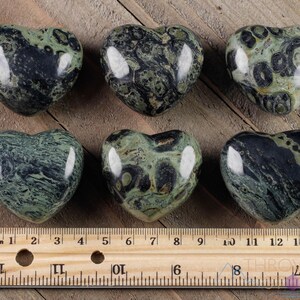 Kamaba Jasper is marbled many shades of green with round green splotches.
Crystals are nature-made therefore each one is unique in appearance.