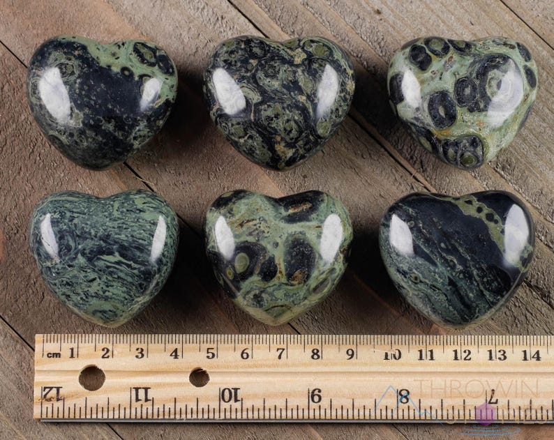 Kamaba Jasper is marbled many shades of green with round green splotches.
Crystals are nature-made therefore each one is unique in appearance.