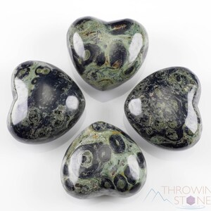 Kamaba Jasper is marbled many shades of green with round green splotches.
Crystals are nature-made therefore each one is unique in appearance.