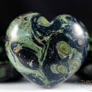 Kamaba Jasper is marbled many shades of green with round green splotches.
Crystals are nature-made therefore each one is unique in appearance.