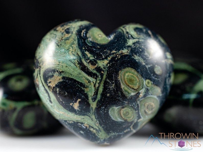 Kamaba Jasper is marbled many shades of green with round green splotches.
Crystals are nature-made therefore each one is unique in appearance.