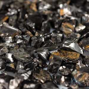 These Elite Noble Shungite Gemstones are a deep black color with a shiny, metallic luster. These rare crystals are the purest form of Shungite and are primarily found in Russia. Shungite is believed to have strong purifying and protective properties.