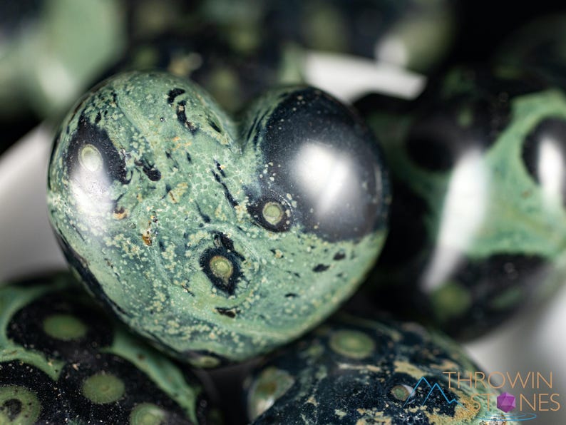 Kamaba Jasper is marbled many shades of green with round green splotches.
Crystals are nature-made therefore each one is unique in appearance.