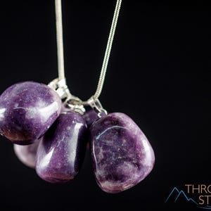 These purple Lepidolite crystal pendants are polished and freeform in shape.
Crystals are nature-made therefore each one is unique in appearance.