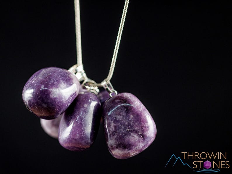 These purple Lepidolite crystal pendants are polished and freeform in shape.
Crystals are nature-made therefore each one is unique in appearance.
