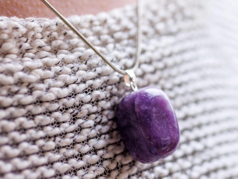 These purple Lepidolite crystal pendants are polished and freeform in shape.
Crystals are nature-made therefore each one is unique in appearance.