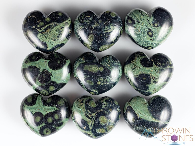 Kamaba Jasper is marbled many shades of green with round green splotches.
Crystals are nature-made therefore each one is unique in appearance.