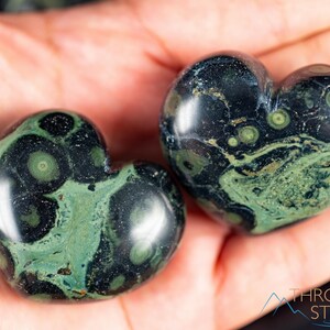 Kamaba Jasper is marbled many shades of green with round green splotches.
Crystals are nature-made therefore each one is unique in appearance.