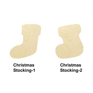 May include: Two wooden Christmas stocking cutouts. The stocking on the left is labeled "Christmas Stocking-1". The stocking on the right is labeled "Christmas Stocking-2".