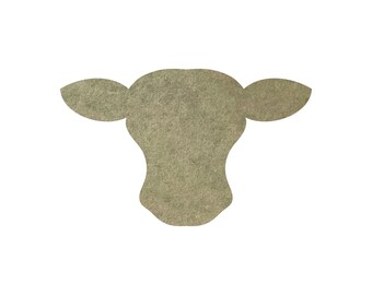 May include: A silhouette of a cow's head in a muted green color. The cow's head is facing forward with large ears.