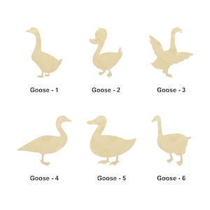 May include: Six different wooden cutout shapes of geese in various poses. The geese are all light brown in colour and are arranged in two rows of three.