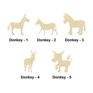 May include: Five wooden donkey cutouts in various poses. Each donkey is a light tan color and has a unique stance. The text "Donkey - 1" through "Donkey - 5" is printed below each cutout.