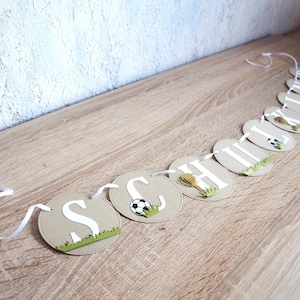 Garland schoolchild with football theme