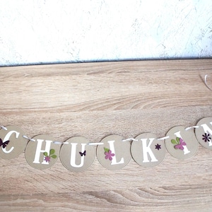 Garland for school enrollment with flowers and butterfly