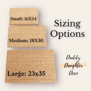 May include: Three doormats in different sizes, small, medium, and large, with the dimensions printed on each. The doormats are made of coir and have a natural brown color. The text "Sizing Options" is printed in black above the doormats. The text "Daddy Daughter Deco" is printed in black on a pink background below the doormats.