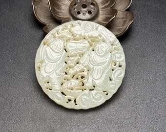 Exquisite hand carved Chinese white jade pendant depicting the two immortals of harmony