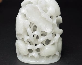 Exquisite hollowed out lotus and crane patterned stove tripod carved purely by hand from Chinese white jade