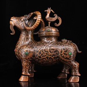 A rare and exquisite Chinese antique handcrafted pure copper high relief carved sheep-shaped incense burner ornament