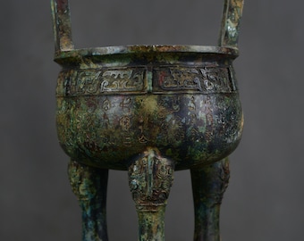 Exquisite bronze tripod sculpture with inscription, handcrafted from Chinese antiques.