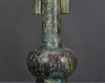 Exquisite bronze pitch-pot sculpture, handcrafted from antique Chinese materials.