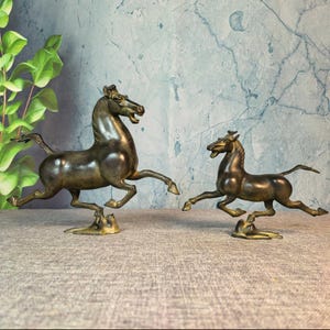A rare and exquisite handcrafted Chinese antique bronze horse stepping on a flying swallow statue