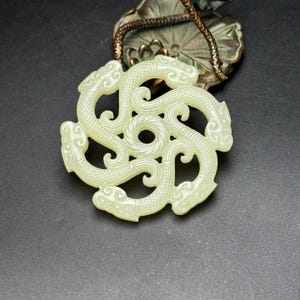 Exquisite and rare six dragons guarding the world jade pendant carved by hand from Chinese white jade
