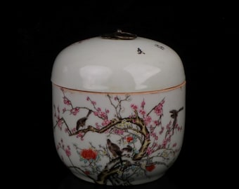 Exquisite Chinese antique famille rose porcelain jar with painted magpie design, handcrafted.