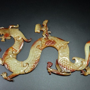 Exquisite and rare dragon jade pendant hand-carved from Chinese white jade