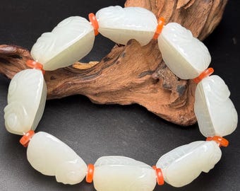 Exquisite cicada-shaped bracelet made entirely of Chinese white jade, hand-carved.