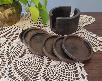 Round faux wood coasters with base, set of 6 // midcentury brown plastic coasters in a round base // vintage barware // bartender gift
