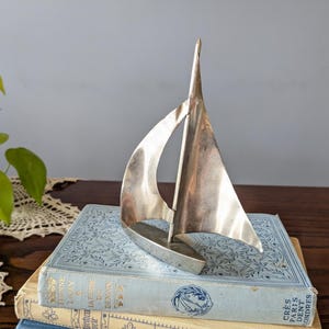 Metal sailboat statue / nautical ship decor / beach house decor / coastalcore / silver sailboat figurine paperweight / artisan sailboat