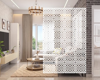May include: White room divider screen with a geometric pattern. The screen is made of wood and has a white finish. The screen is standing in a living room with a couch, coffee table, and rug.
