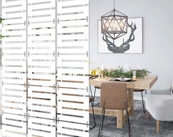 May include: White wooden room divider with a slatted design. The divider is in front of a dining room with a wooden table, chairs, and a geometric chandelier.