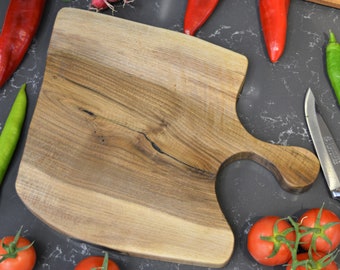 Tabla rústica para carne, queso y servir de madera maciza de nogal con mango y borde vivo
